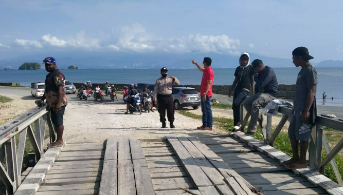 Adaptasi Dengan Kebiasaan Baru, Polisi Datangi Warga Lakukan Sosialisasi