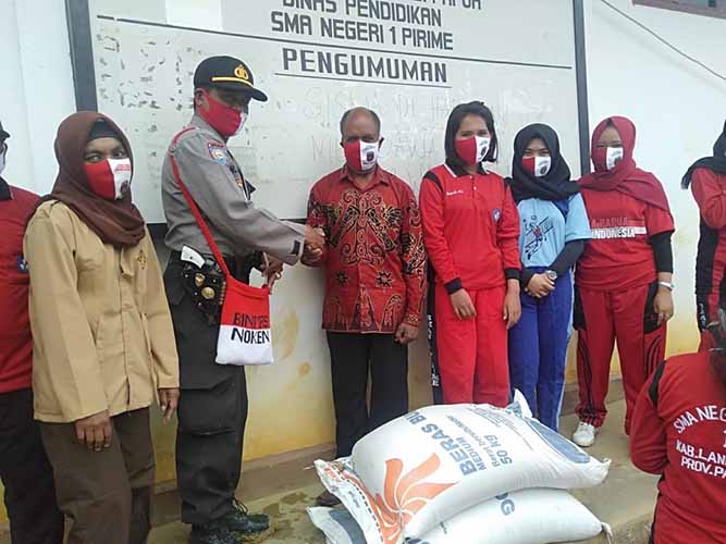 Polisi di Lanny Jaya Salurkan 300 Kg Beras Bantuan Polri Tahap III Ke Warga