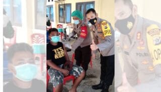 Dukung PON, Polres Yapen dan Kodim 1709 Yawa Gelar Vaksinasi Sasar Tenaga Buruh dan Sopir Angkutan Umum