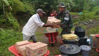 Tiba Dilokasi TMMD Satgas Kodim 1709 Yawa Mendapat  Sambutan Hangat Dari Masyarakat Poom
