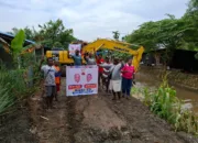 Aksi Nyata Mari-Yo Turunkan Alat Berat Bersihkan Drainase di Organda Disyukuri Warga