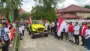 Ribuan Peserta Warnai Konvoi Merah Putih Semarak Piala Dunia 2026 di Jayapura: Wadah Sportivitas, Pelestarian Budaya, dan Kepedulian Sosial